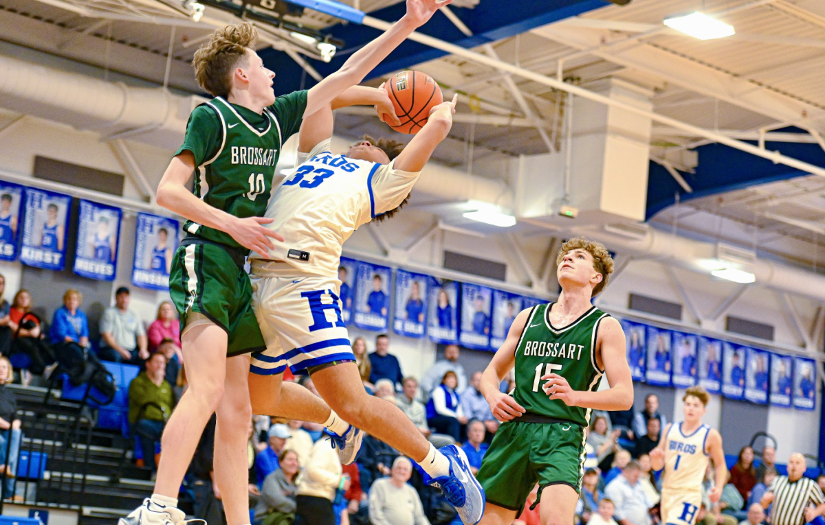 Junior Dom Gregory goes up for a contested shot.